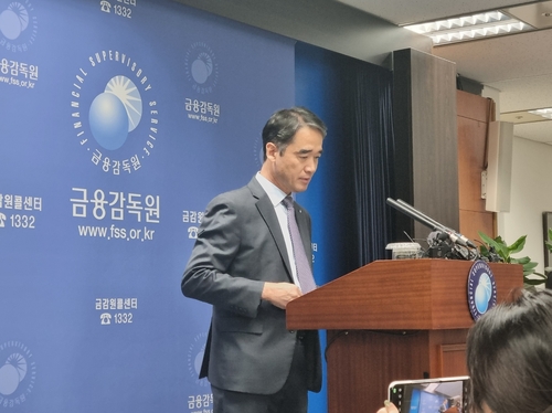 연이은 두산 합병 정정 신고에…금감원 "정확한 설명 기재해야"_정필중