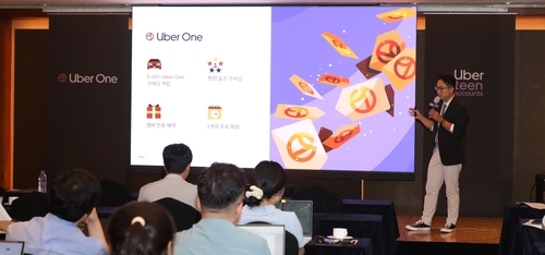 택시도 멤버십 시대… 카카오와 우버 '누가 이길까'_변명섭
