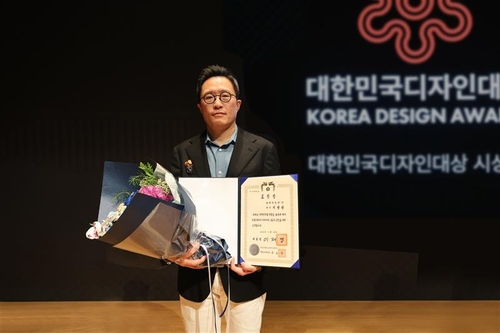 현대차 디자인 칭찬 줄 잇더니…글로벌 마케팅 수장, 대통령 표창_이재헌