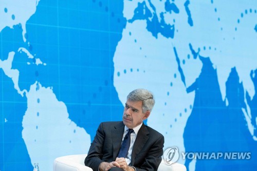 Queens College President Mohamed El-Erian listens during a discussion about the global economy at the 2022 IMF/World Bank annual meeting October 13, 2022, in Washington, DC. (Photo by Brendan Smialowski / AFP)