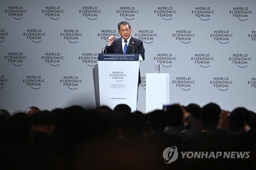 Chinese Premier Li Qiang delivers his speech on the opening ceremony of the World Economic Forum (WEF) in Tianjin on June 27, 2023. (Photo by WANG Zhao / AFP)