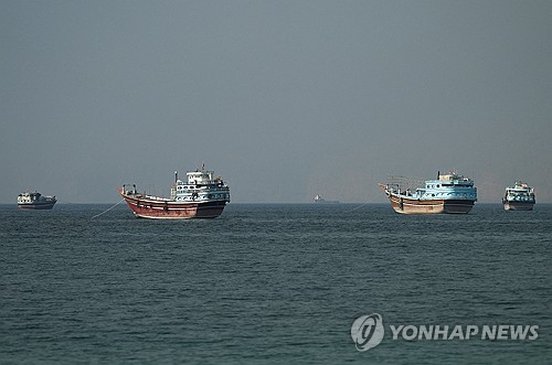 Vessels at the Strait of Hormuz, as seen from Musandam, Oman, June 26, 2026. REUTERS/Stringer