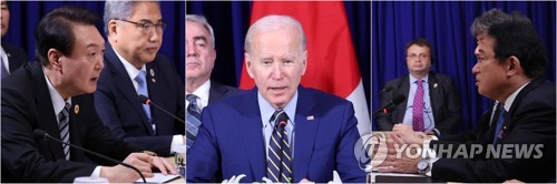 (프놈펜=연합뉴스) 서명곤 기자 = 13일(현지시간) 캄보디아 프놈펜 한 호텔에서 열린 한미일 정상회담에서 윤석열 대통령(왼쪽부터),조 바이든 미국 대통령, 기시다 후미오 일본 총리가 발언하고 있다. 2022.11.13 seephoto@yna.co.kr
